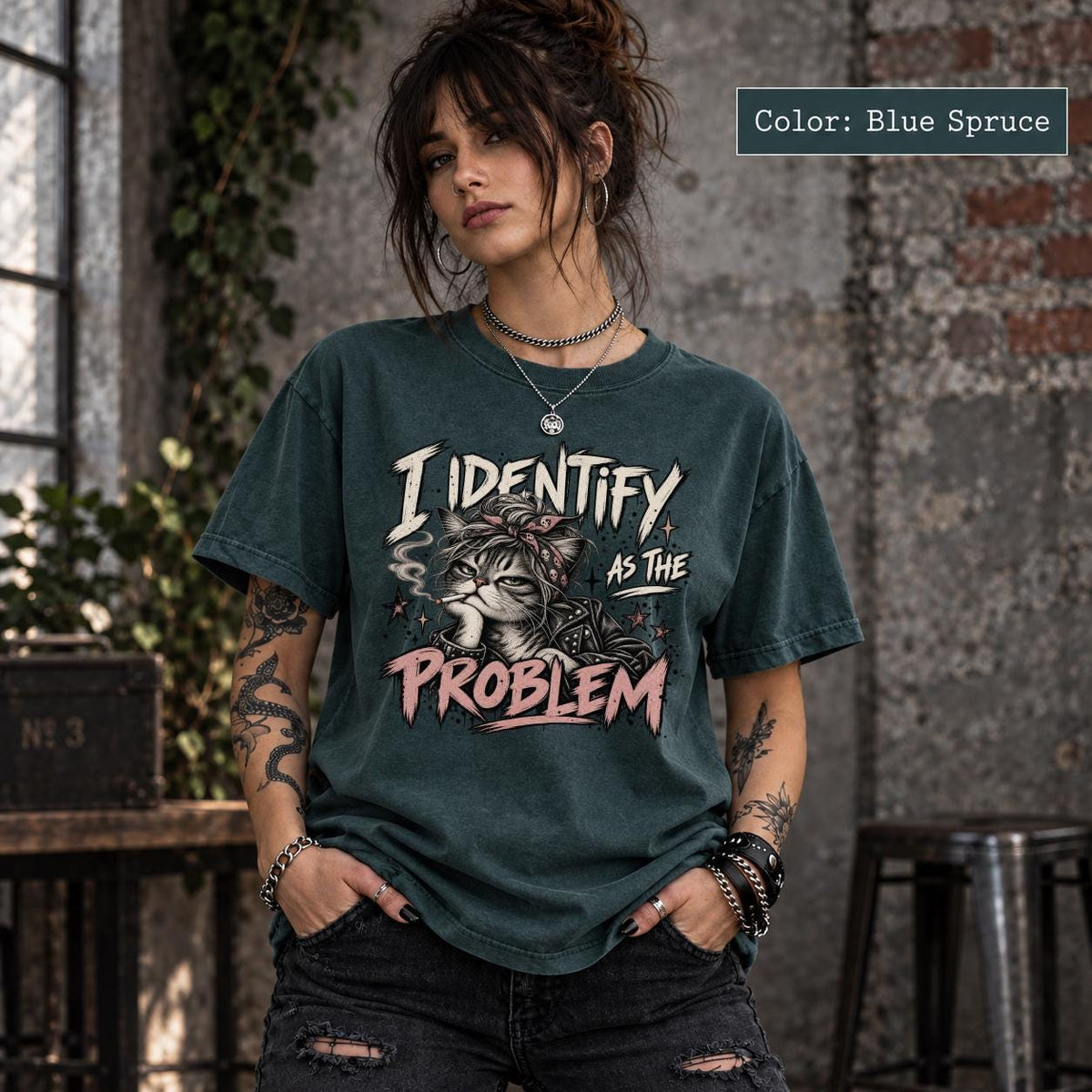 Blue Spruce Comfort Colors tee featuring the edgy cat design on a deep green-blue garment-dyed shirt.