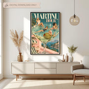 Martini Hour retro cocktail wall art displayed above a cream console table with dried botanical arrangements. The colourful poster features four glamorous women lounging inside an oversized martini glass overlooking the Italian Riviera coastline.