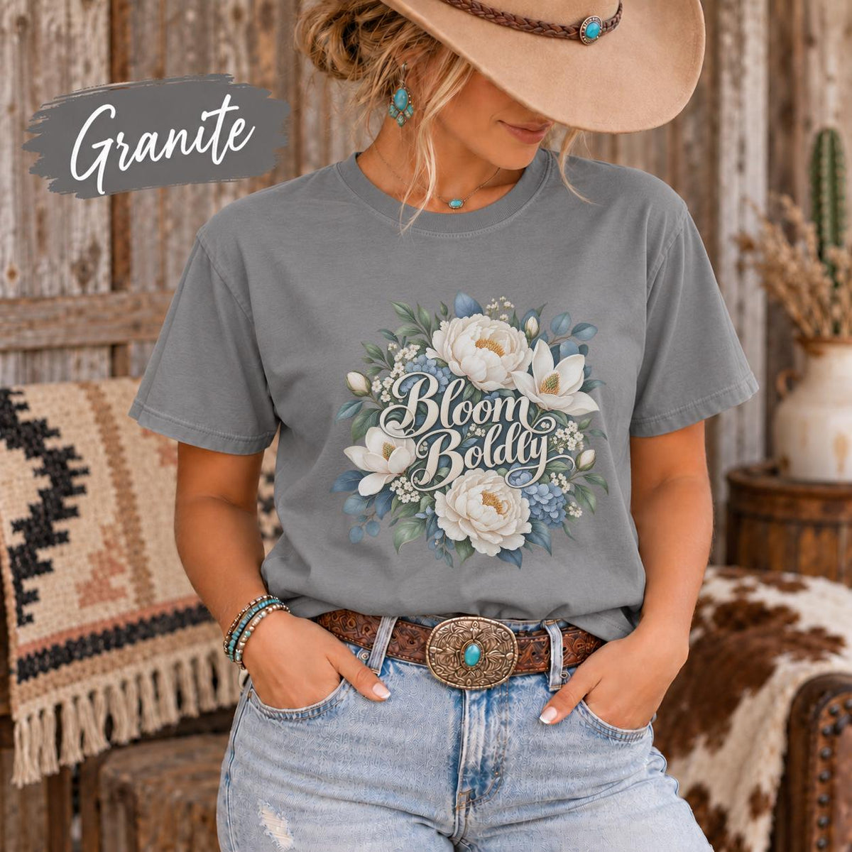 Graphite Comfort Colors tee displaying the floral artwork in muted blue, cream, and green tones with a casual vintage look.