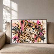 Colorful leopard printable artwork shown in a light wood frame leaning against a wall in a bright minimalist room.