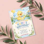 Birthday Boy Duck Canva invitation displayed against a soft blush background with green botanical leaves, showing cheerful duckling artwork and customizable party details.