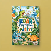 Dinosaur birthday invitation displayed on a mustard yellow background, featuring green, blue and orange cartoon dinosaurs, bold birthday lettering and colorful jungle-inspired decorations.