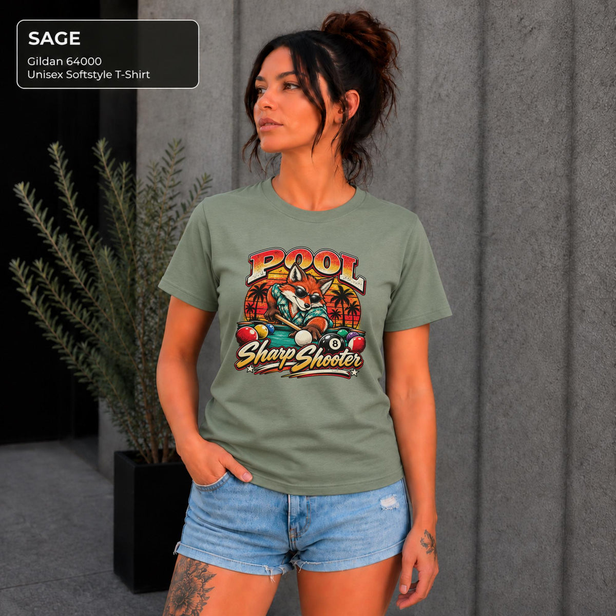 Sage Softstyle tee featuring the colorful sharp shooter fox design with pool balls, palm trees, and vintage-style lettering.