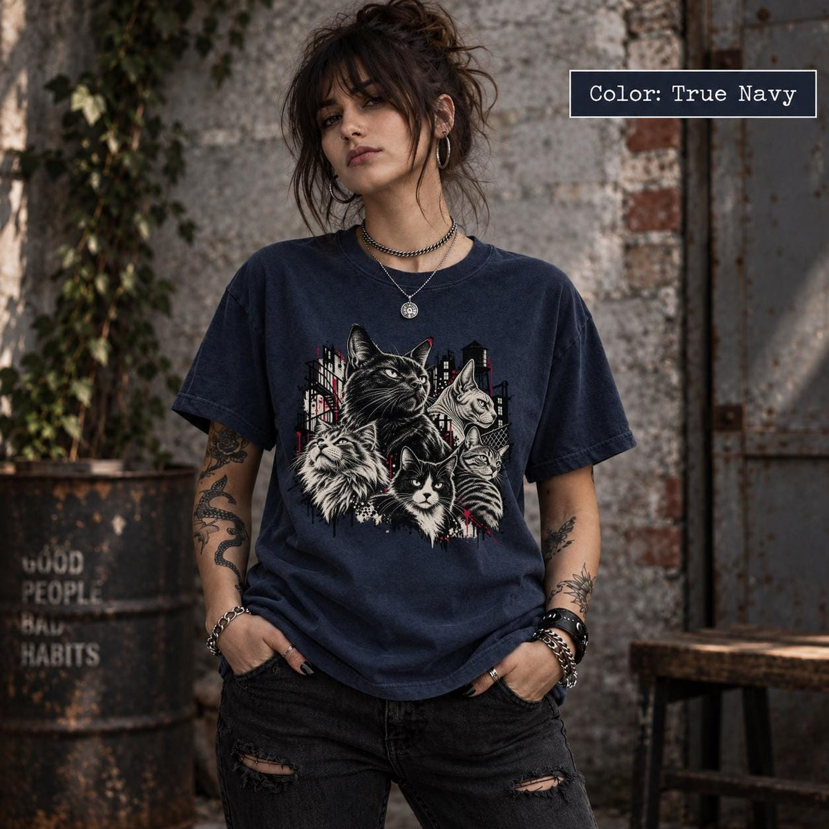 True Navy Comfort Colors tee displaying the dark academia cat design with multiple feline portraits and grunge-inspired artwork.