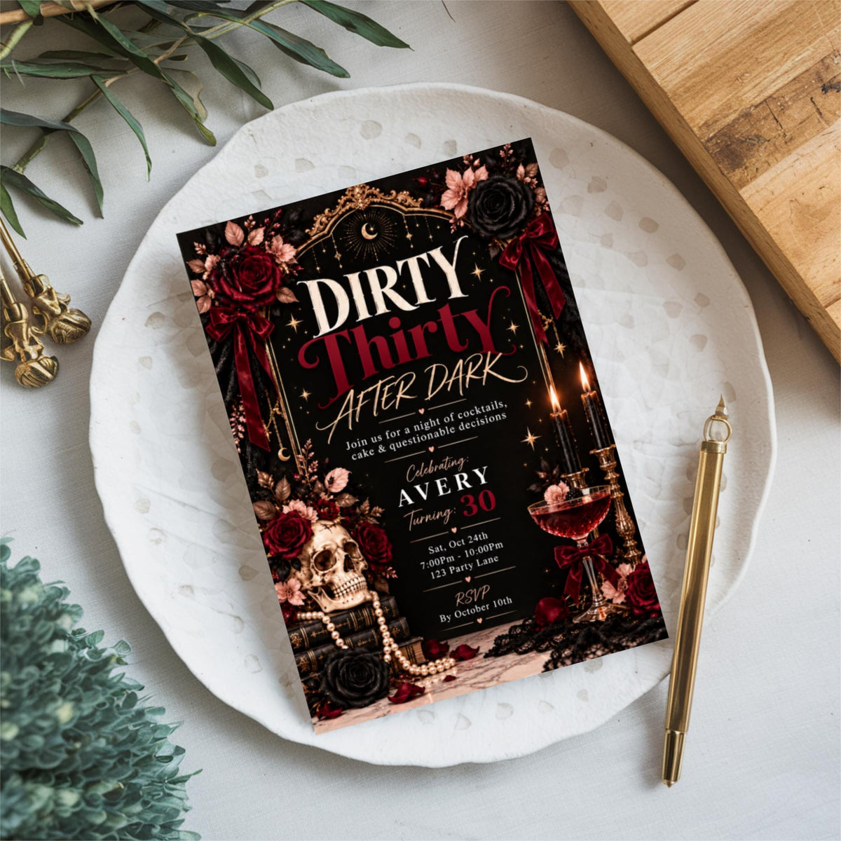 Dirty Thirty cocktail birthday invitation displayed on a white decorative plate with greenery and soft neutral styling. Printable Canva template featuring a sophisticated black, red, and gold celebration theme.