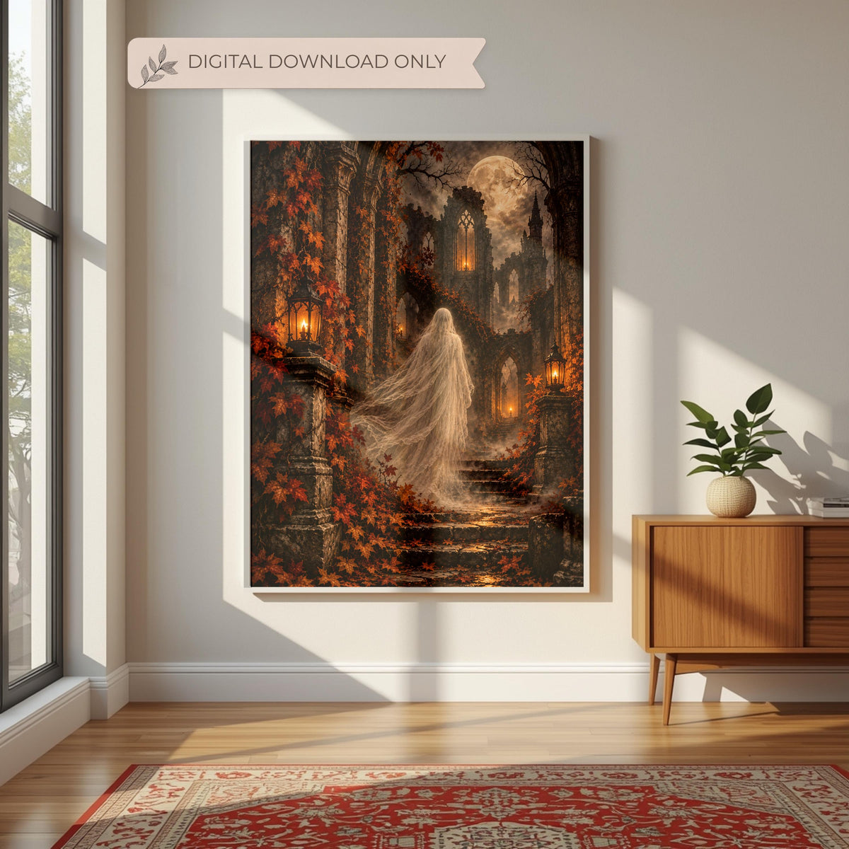 Romantic gothic ghost artwork displayed above a wooden console with neutral furnishings and greenery. The framed printable features an ethereal veiled woman walking through ancient ruins in warm autumn moonlight.