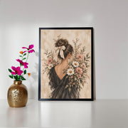 Vintage-inspired floral portrait displayed on a neutral wall beside a small vase of vibrant pink flowers. Feminine botanical artwork combines muted greenery, delicate blossoms, and romantic fashion details.