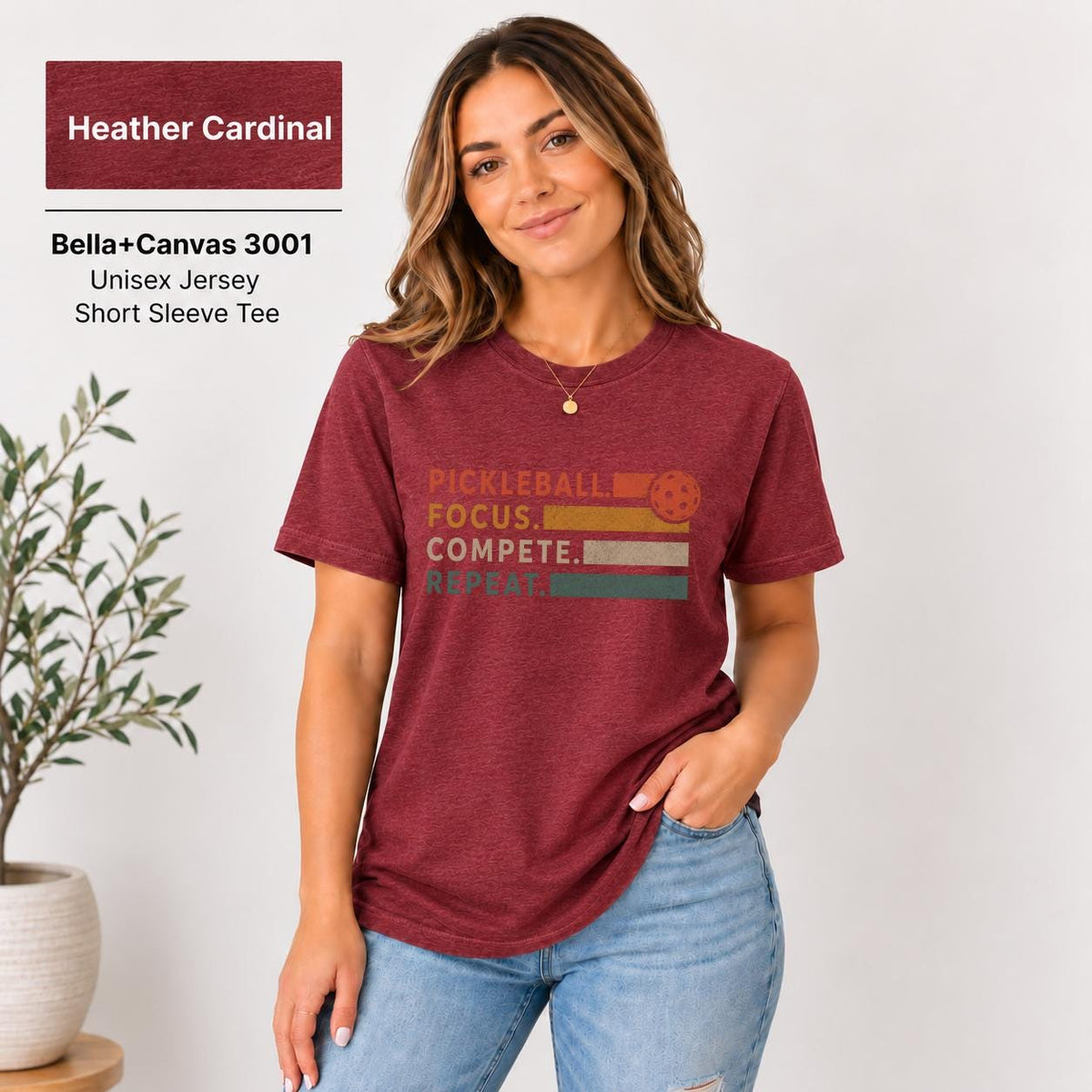Heather Cardinal shirt featuring the minimalist statement design with warm orange and darker lettering.