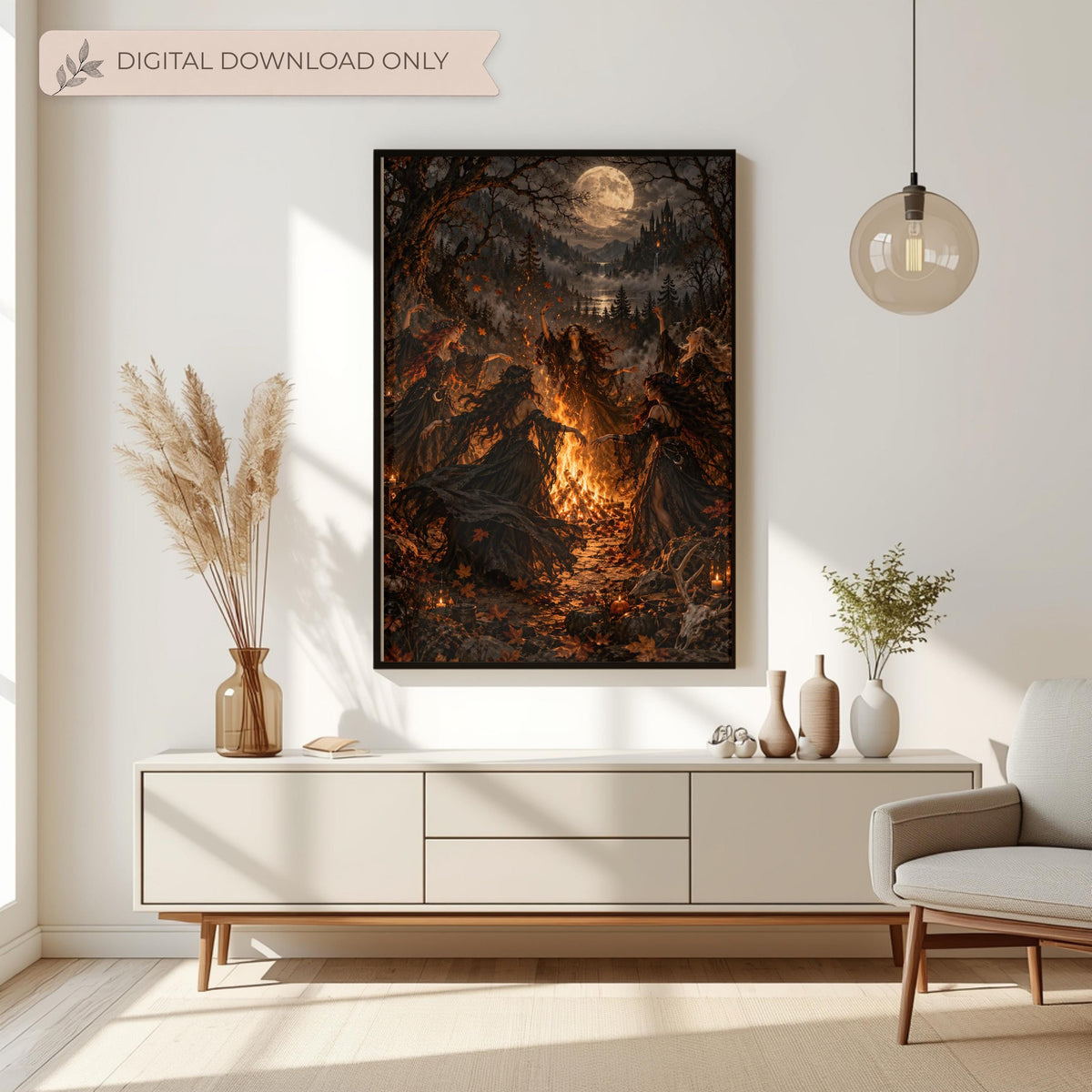 Witchy fantasy poster displayed above a cream console table with dried flowers and simple decorations. The artwork features an enchanted forest, glowing bonfire, Gothic castle, and mysterious moonlit atmosphere.