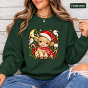 1. Forest Green Gildan 18000 crewneck displaying the cute holiday cow artwork with red, cream, and gold accents for a classic Christmas look.