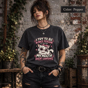 Pepper Comfort Colors shirt featuring the funny cat quote design with pink, cream, and white details on a dark vintage-style tee.