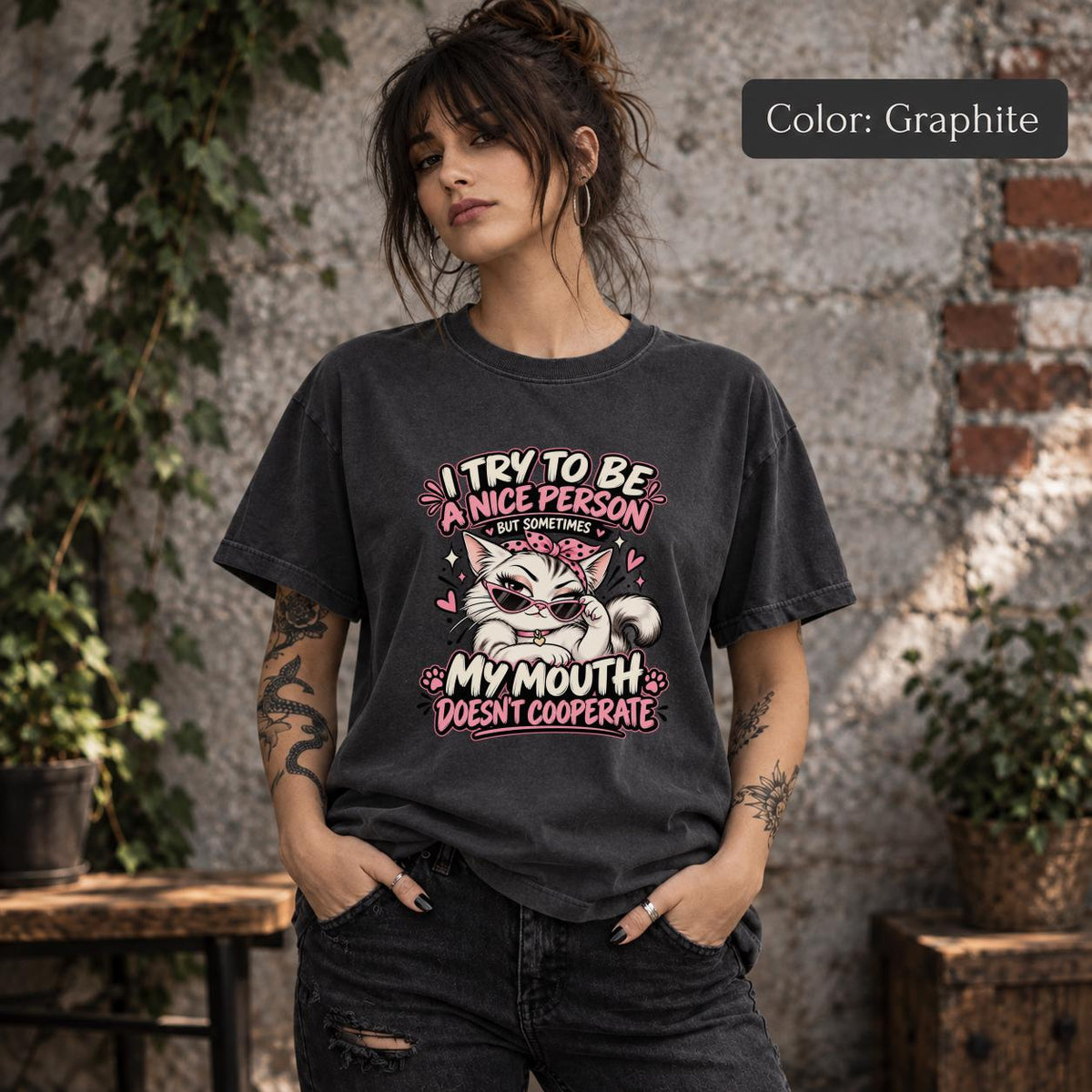 Graphite Comfort Colors tee showing the same sarcastic kitty graphic in a dark neutral color option.