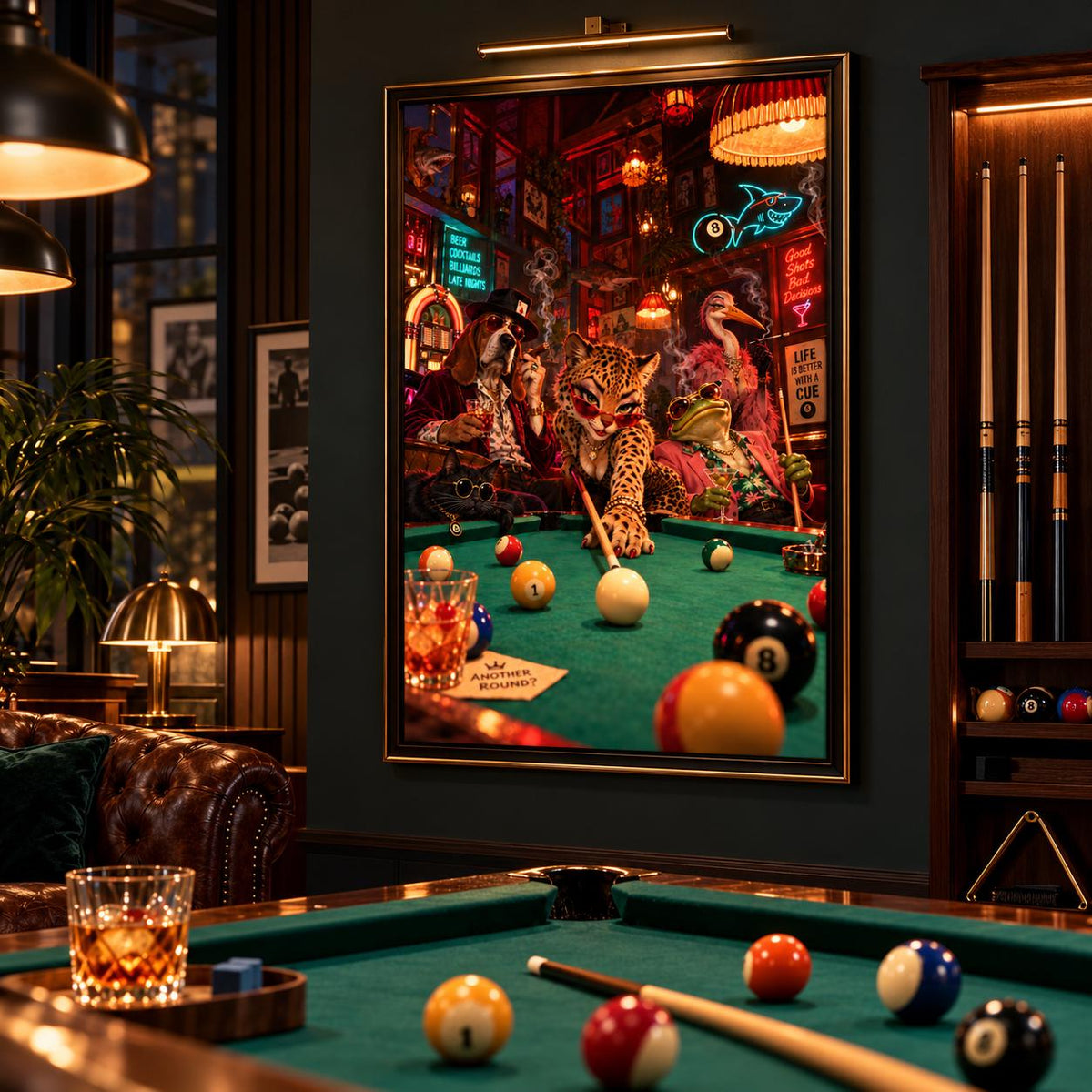 Large framed billiards poster displayed beside a wall-mounted rack of wooden pool cues. The dark green walls, rich timber accents, and green pool table complement the colourful retro animal illustration.