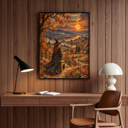 Vintage moonrise landscape painting displayed in a black frame on a light wooden console beside a leafy houseplant. The artwork features an enchanting witch, golden autumn trees, glowing lantern, and peaceful river.