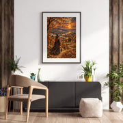 Mystical witch wall art displayed above a modern kitchen countertop with wooden cabinets and a black pendant light. The vintage-style painting features a golden harvest moon, autumn forest, and enchanting countryside scenery.