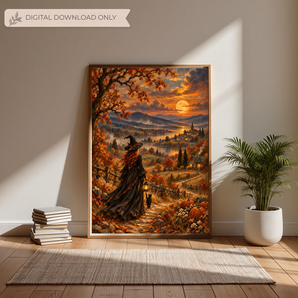 Vintage autumn witch wall art displayed in a black frame above a cream console table with dried botanical decorations. The painting features a red-haired witch, black cat, glowing lantern, golden harvest moon, and colourful fall landscape.