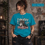 Topaz Blue Comfort Colors T-shirt showing the edgy cat graphic with bold cream and pink text on a bright teal shirt.