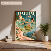 Vintage-inspired cocktail wall art resting on a light wooden console table against a warm neutral wall. The Martini Hour design features four fashionable women relaxing in a giant martini glass overlooking coastal cliffs.