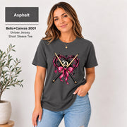 Asphalt Bella+Canvas shirt displaying the billiards heart design with crossed pool cues and bright pink accents on a charcoal tee.