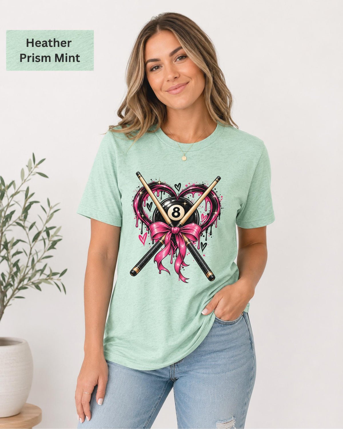 Heather Prism Mint Bella+Canvas shirt featuring the 8 ball heart graphic with crossed cues, bow, and pink accent details.