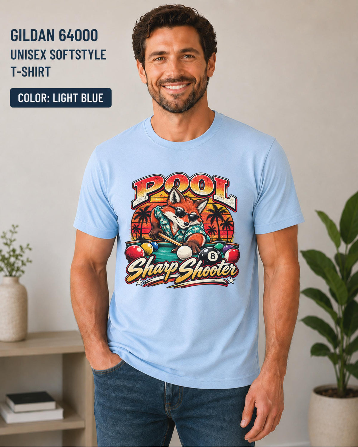 Light Blue Gildan 64000 shirt featuring the sharp shooter fox pool design with cue stick, 8 ball, and sunset accents.