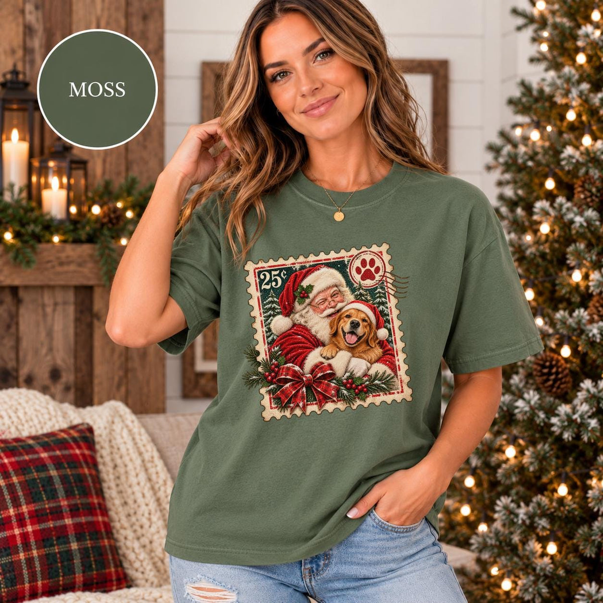 Moss Comfort Colors shirt featuring the personalized holiday graphic with Santa holding a dog, festive greenery, snowy trees, and classic Christmas colors.