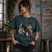 Blue Spruce Comfort Colors tee displaying the dark cat artwork with multiple illustrated cats and a moody grunge-inspired background.
