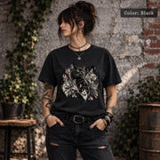 Black Comfort Colors 1717 T-shirt featuring a gothic multi-cat graphic with layered feline portraits, distressed detailing, and black, cream, and red accents.
