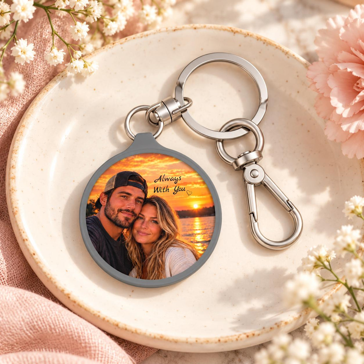Custom picture keychain displayed in a small dish with floral accents, featuring a personalized couple image and silver key ring.