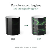 Hot and cold comparison: the loon mug is solid black when cold, and the loon and northern lights design appears when it is filled with a hot drink